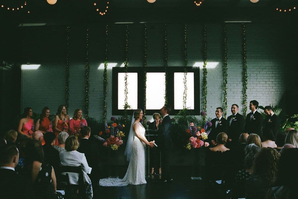 Couple celebrating with their wedding party