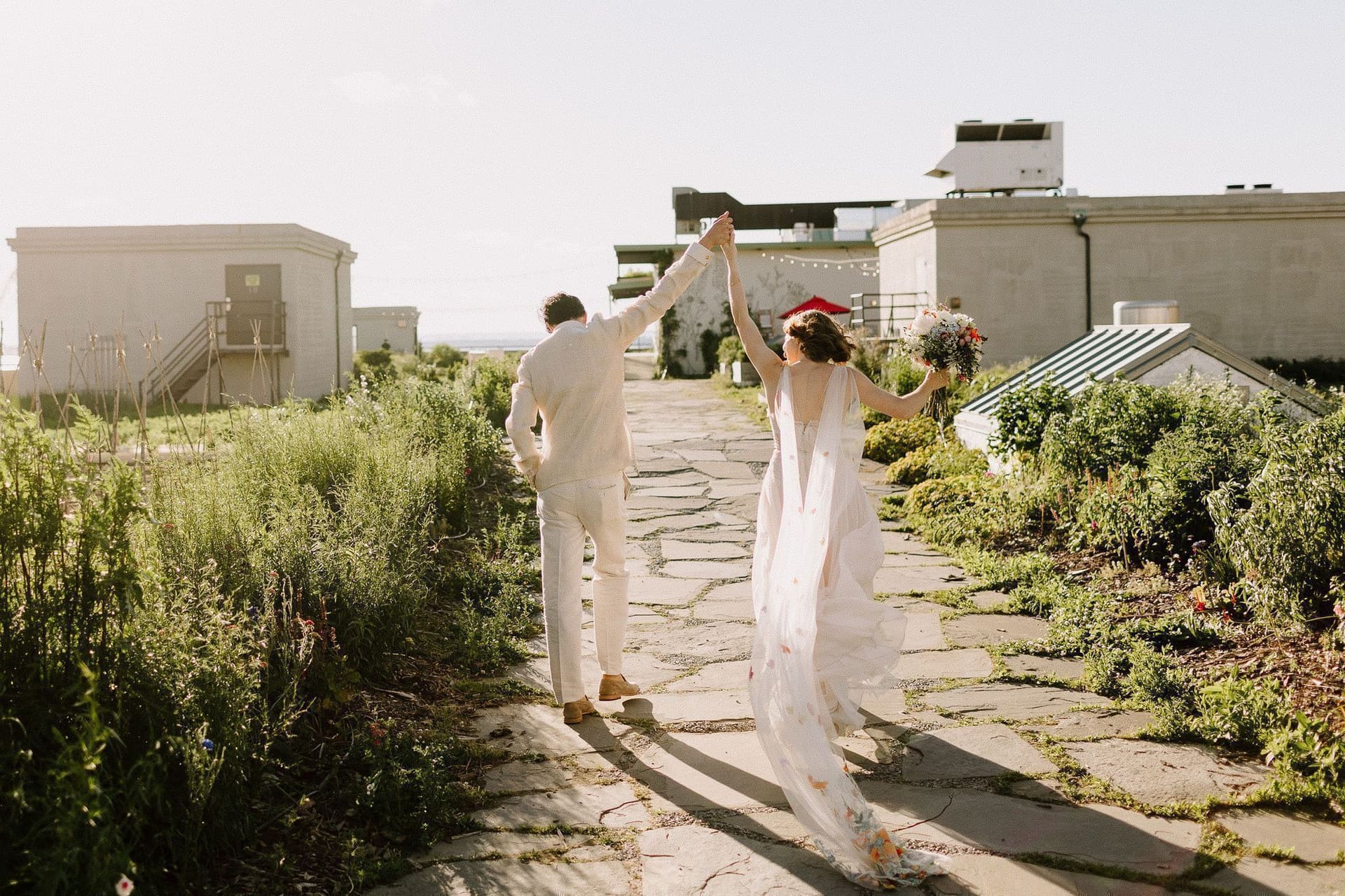 Couple celebrating with their wedding party